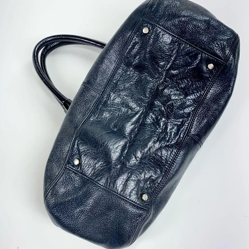 Kate Spade black leather shoulder bag w/ patent straps & gold twist clasp